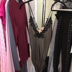 Black patterned mesh body suit